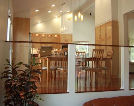 picture of a remodeled luxurty kitchen with a kitchen island and stainless steel appliances